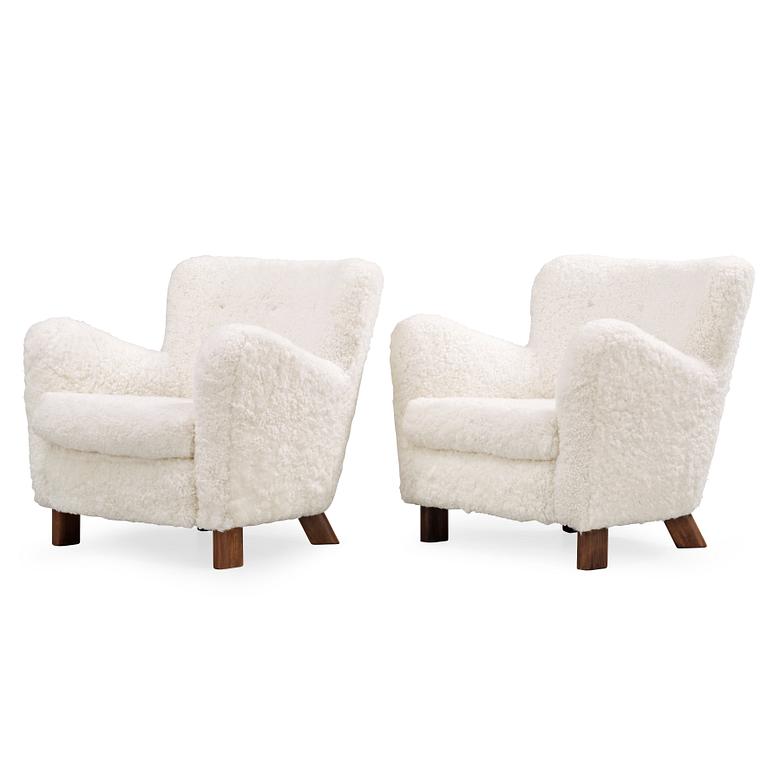 A pair of Fritz Hansen 'Model 1669' armchairs, Denmark.