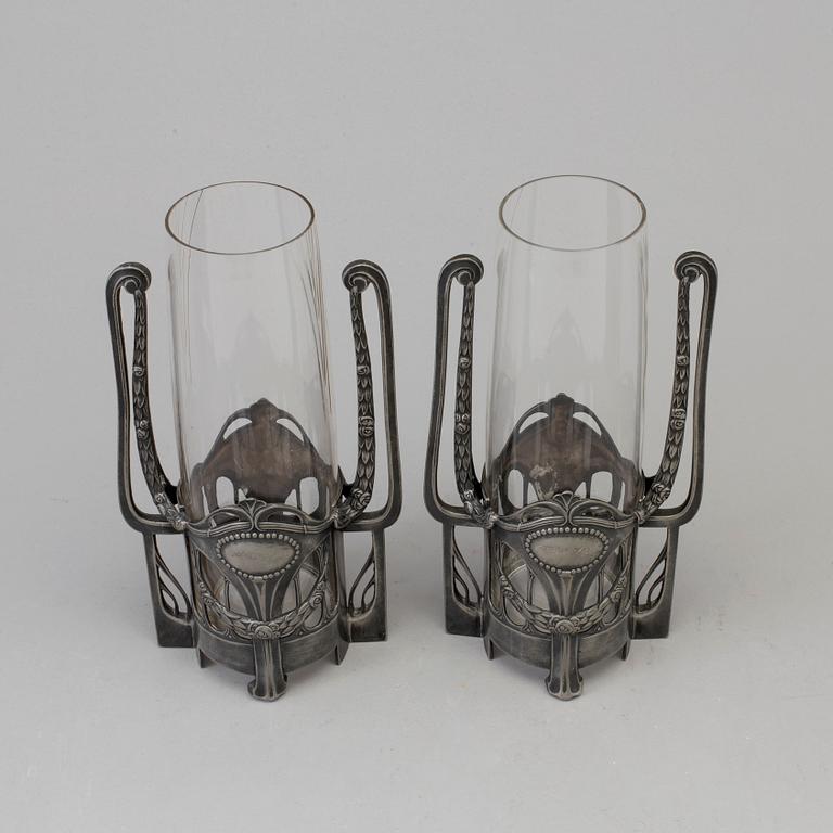 A pair of early 20th century glass vases.