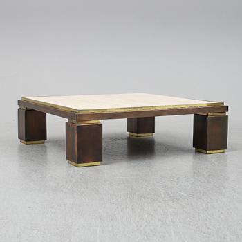 A travetine and brass sofa table, 1970s, probably Belgo Chrome.