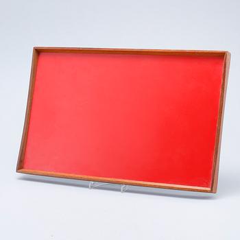 A table tray, model designed by Finn Juhl in 1965.