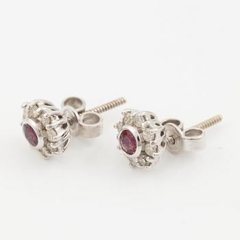 Pendant with gold chain, 
Pendant with white gold chain, 
Earrings a pair, rubies with brilliant-cut diamonds.