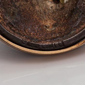 Hänge/brosch, sterlingsilver, guld och diamant ca 0.03 ct. NOR-koru, Raumo 1982.