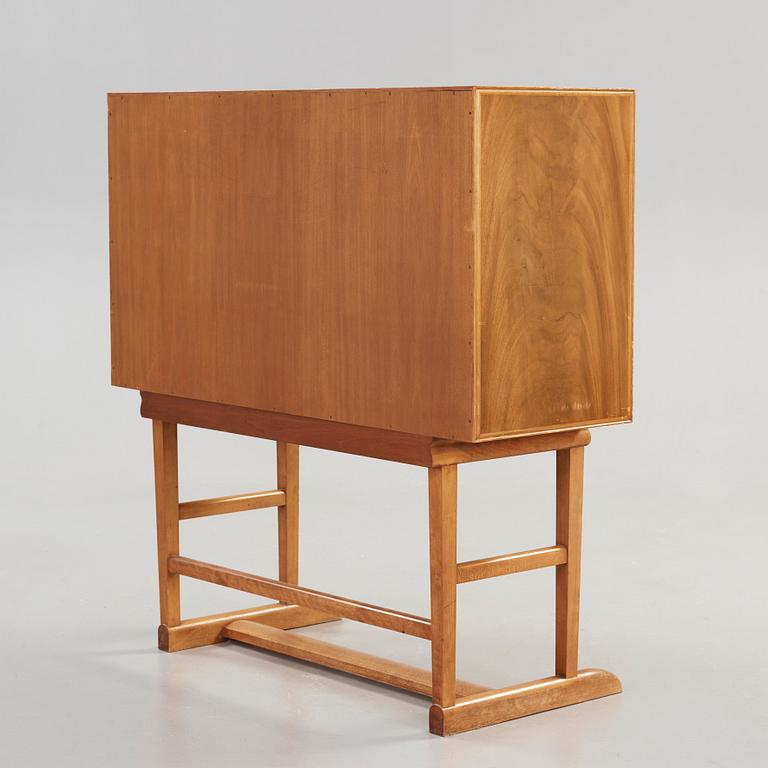 Josef Frank, a mahogany secretaire, model 1036, Svenskt Tenn Sweden, probably 1940-50's.