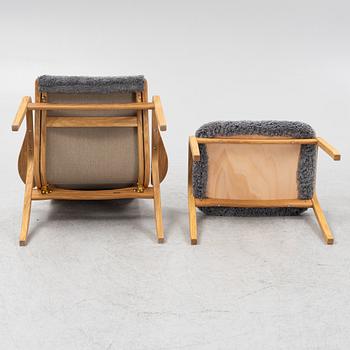 An Yngve Ekström armchair with footstool, "Lamino", Swedese, 21st century.