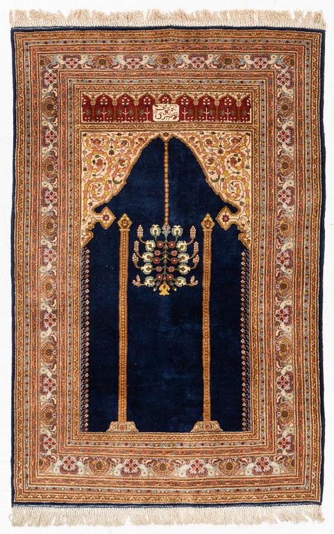 An oriental rug, c. 190 x 125 cm.