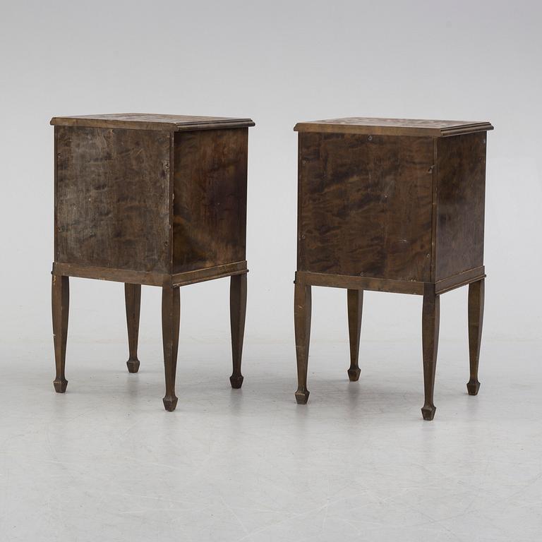 a pair of Art Déco bedside tables.