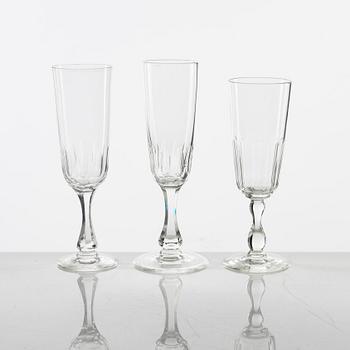 A group of 36 similar champagne glasses, of varying manufacturing, mostly around 1900.