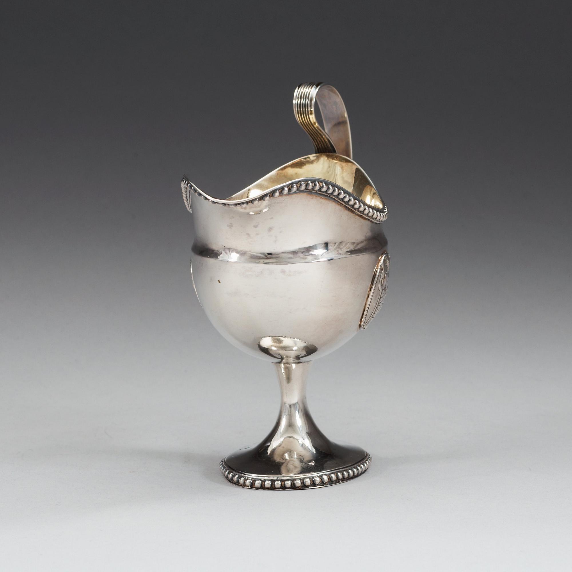 A Swedish 18th century parcel-gilt cream-jug, makers mark of Anders Fredrik Weise, Stockholm 1794.