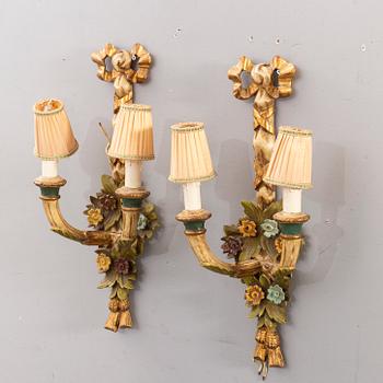 A pair mid 20th century wooden wall lamps from Paoletti, Firenze Italy.