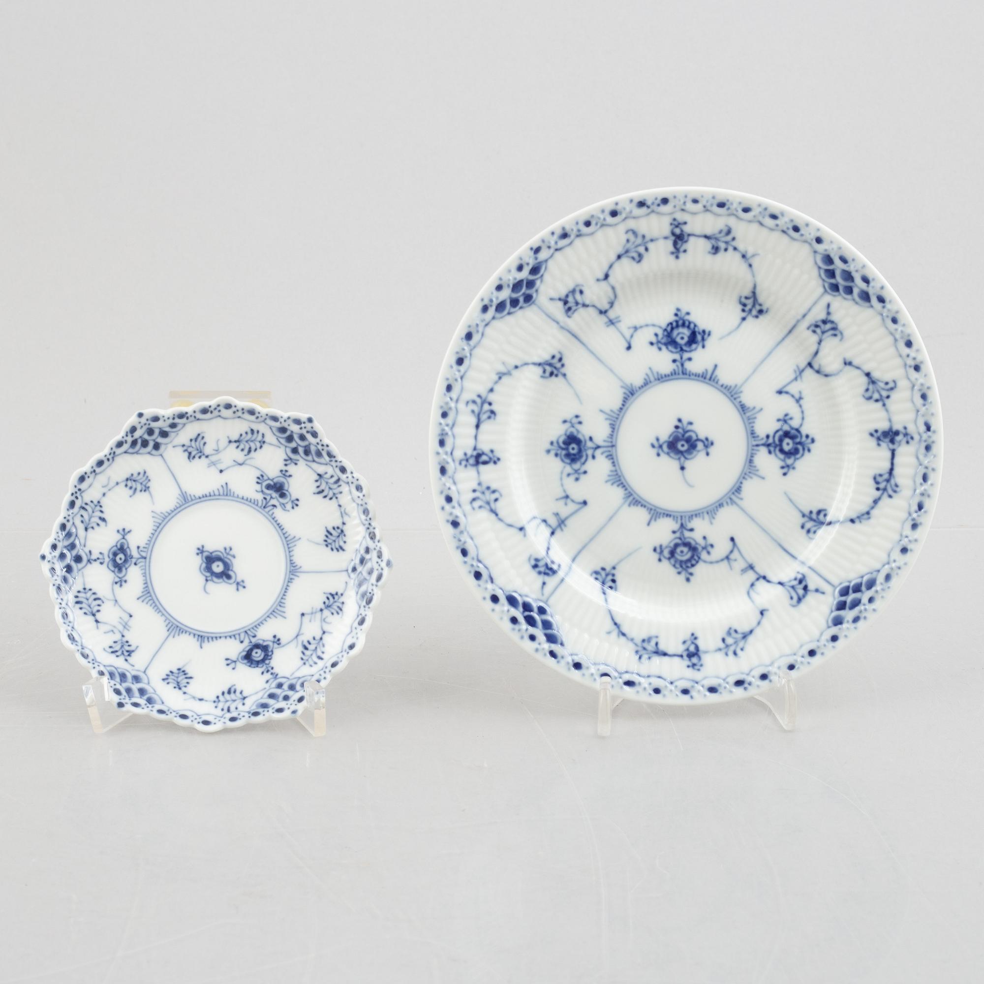 Royal Copenhagen, a 25-piece mocha porcelain service, half lace "Blue Fluted", Denmark.