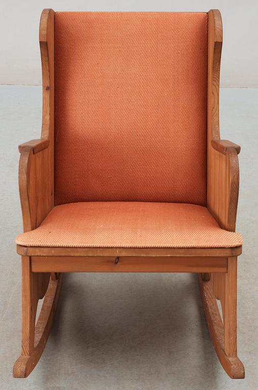 An Axel Einar Hjorth 'Lovö' stained pine rocking chair Nordiska Kompaniet, 1930's.