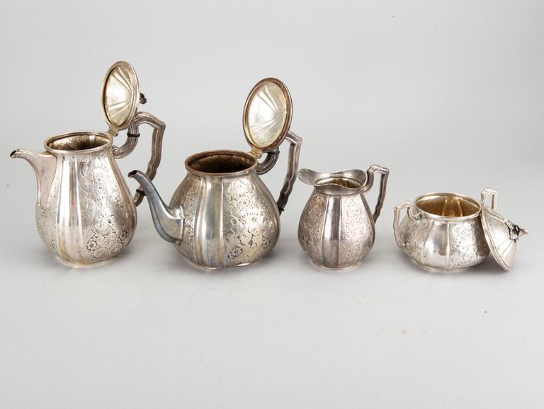 TESERVIS 4 dlr låghaltigt silver tidigt 1900-tal.