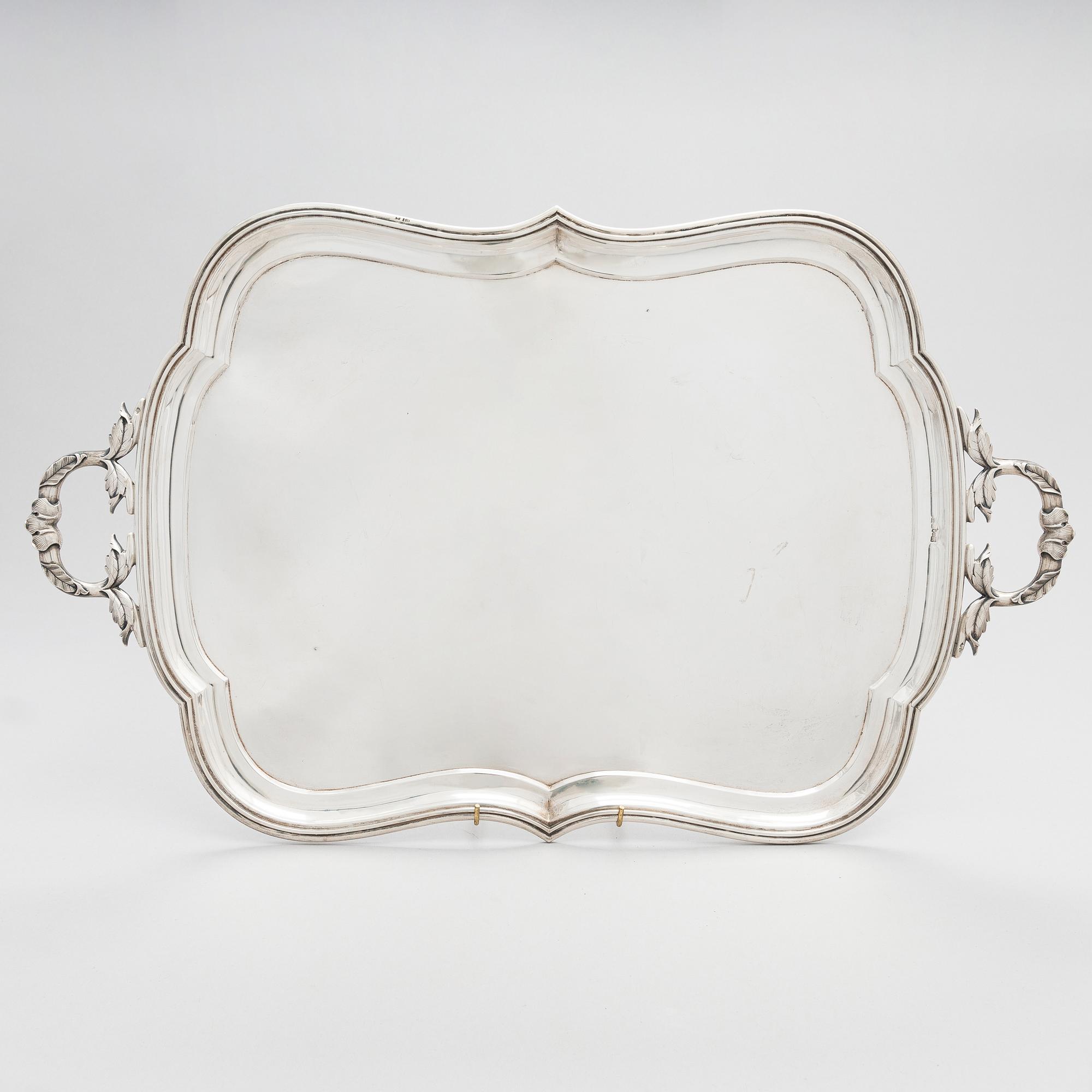 A Russian silver tray, Moscow, maker's mark IV. Unclear year mark, assay master mark Aleksandr Kudrin (1878-82).