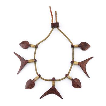 Vivianna Torun Bülow-Hübe, a leather necklace with brass and carved wooden details, most likely 1948-1949.
