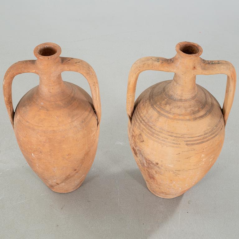 Two European earthenware jars from the first half of the 20th century.