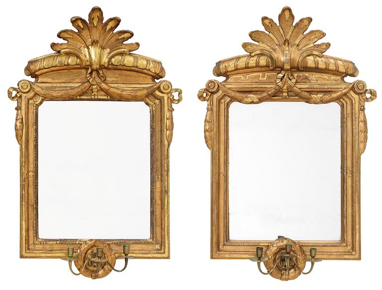 A matched pair of Gustavian three-light girandole mirrors, by N. Sundström.