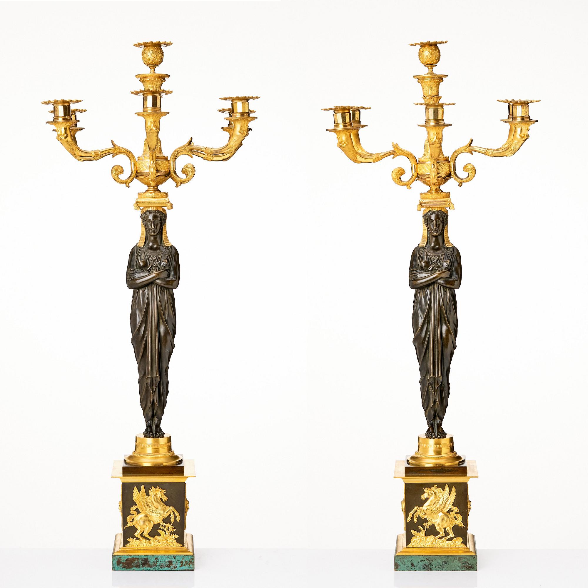 A pair of important six light Retour d`Egypt Empire candelabra.