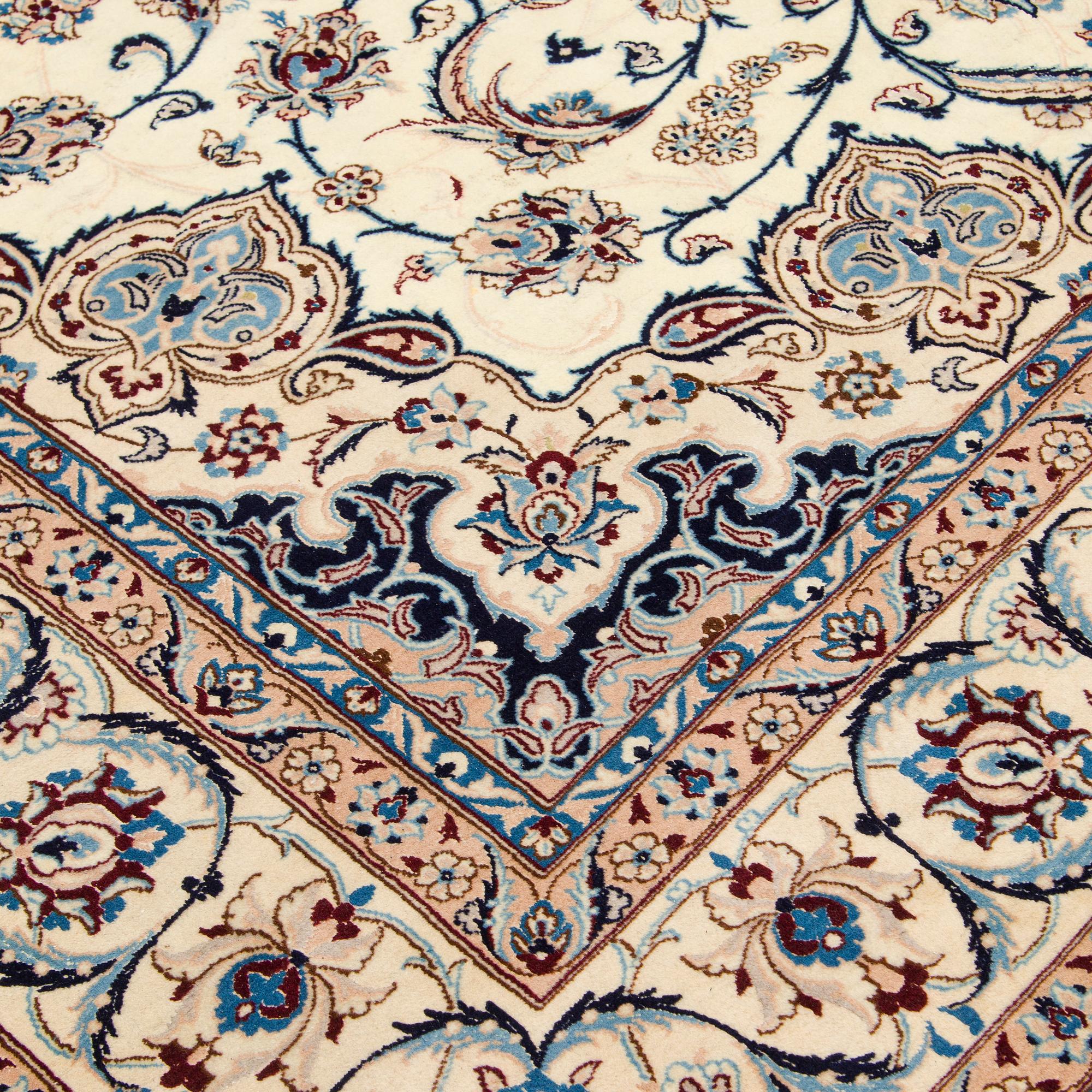 A carpet, Nain, part silk S.K 9LAA. Circa 352x248 cm.