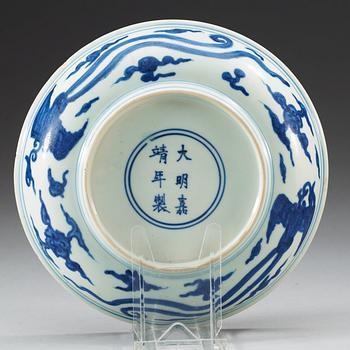 A blue and white Phoenix dish, Ming dynasty with Jiajings six character mark and period (1522-66).