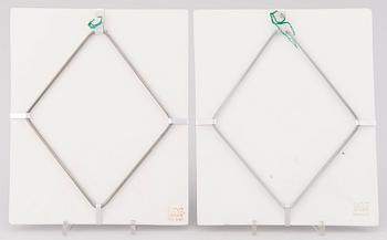 HELJÄ LIUKKO-SUNDSTRÖM, A set of two ceramic wall plaquets, signed. Arabia Finland.