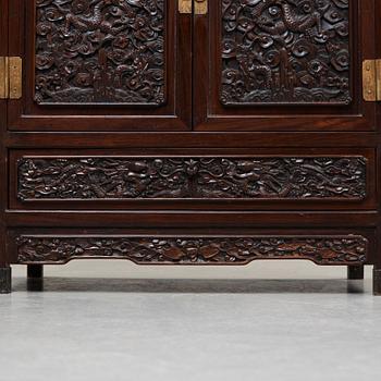 A pair of Chinese hardwood cupboards, late Qing dynasty (1644-1912).