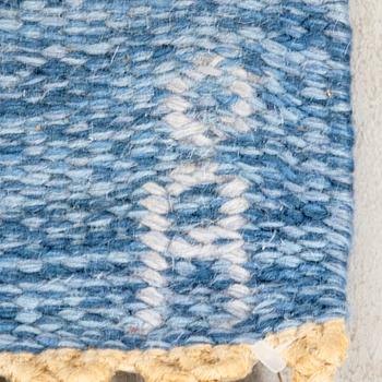 Anna-Johanna Ångtröm, a flat weave carpet labeled 234x163 cm.