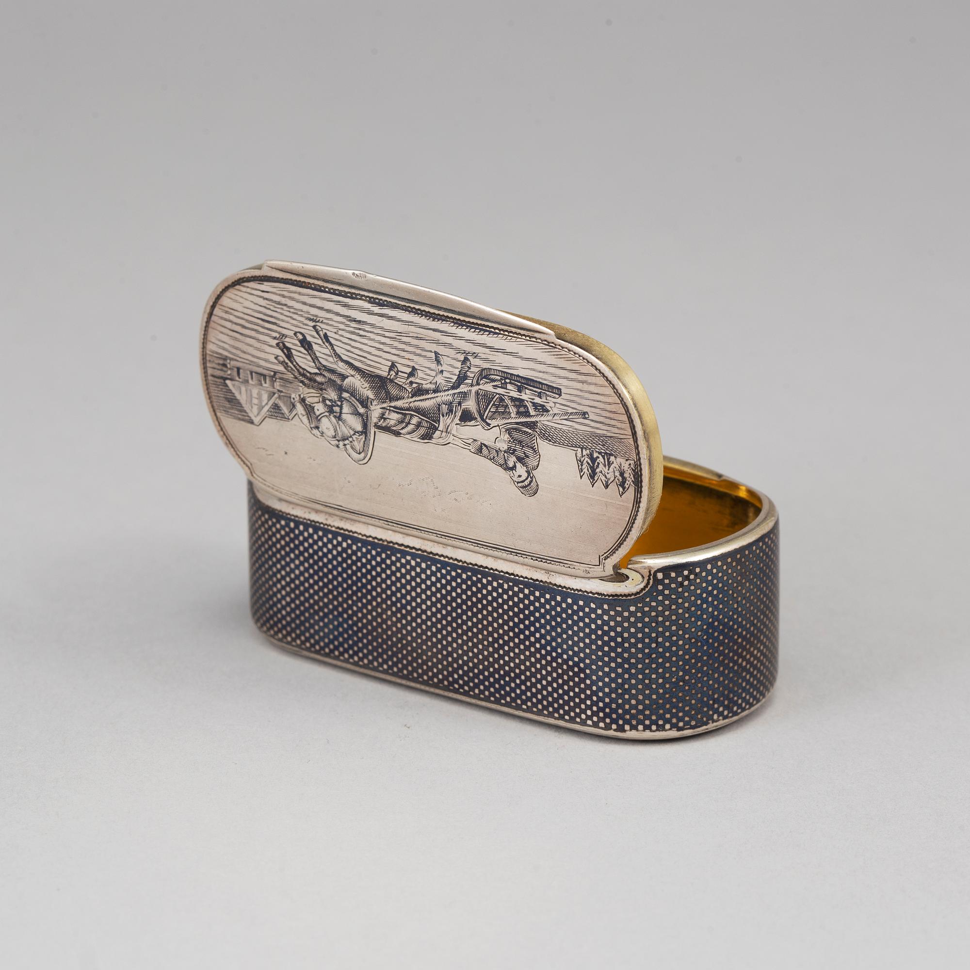 A Russian parcel-gilt silver and niello box, mark of Gustav Klingert, Moskva 1876.