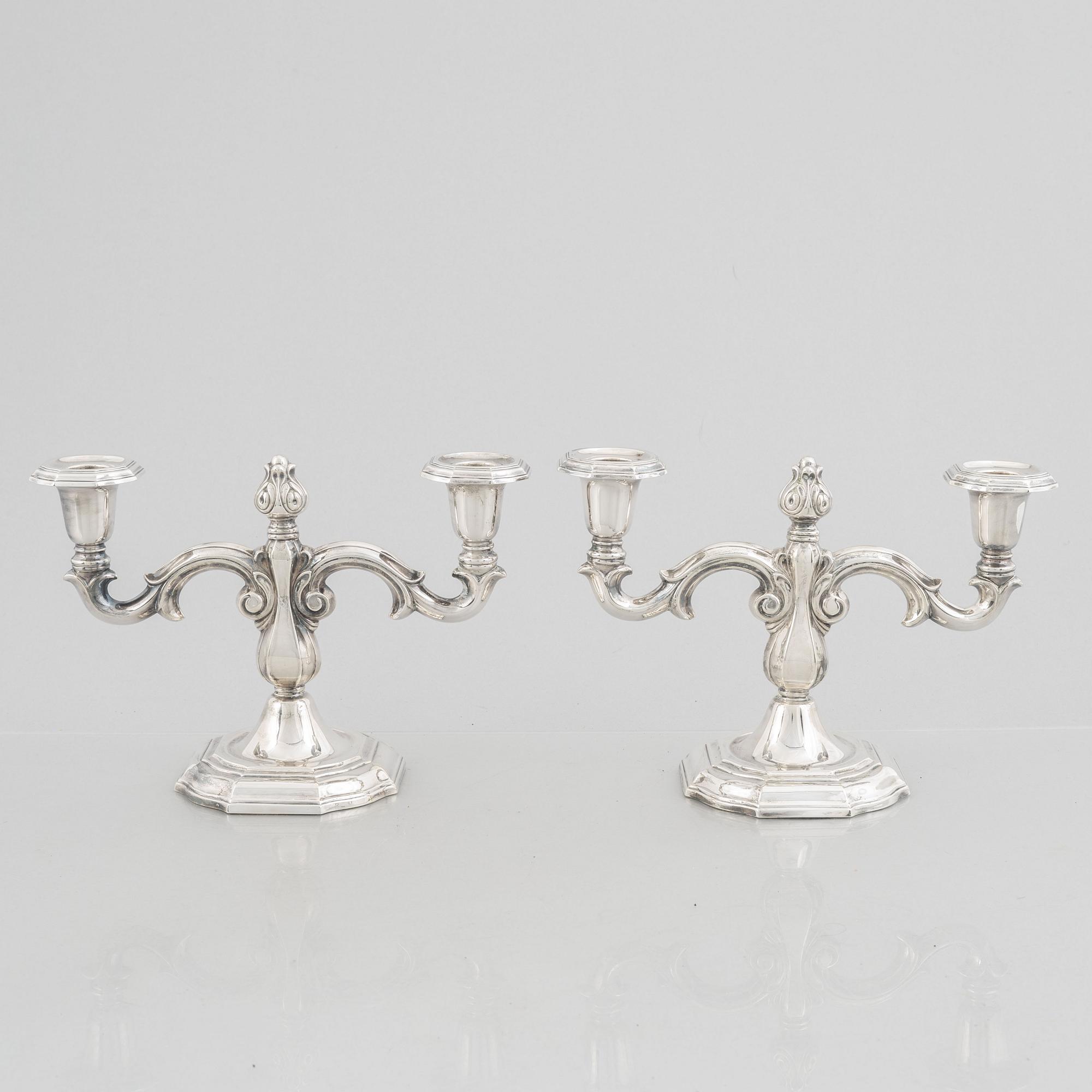 A pair of Swedish silver candelabras, marks of CG Hallberg, Stockholm 1959.
