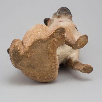 An early 20th century terracotta dog.