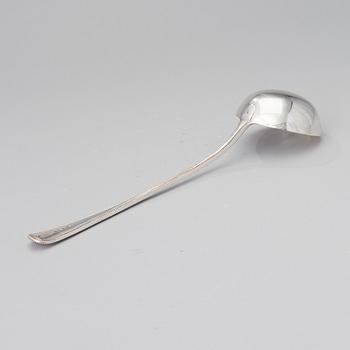 A soup ladle in sterling silver, mark of George William Adams, London 1867.