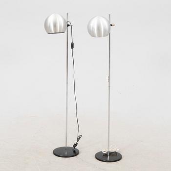 A pair of Heimi steel 1970s floor lamps.
