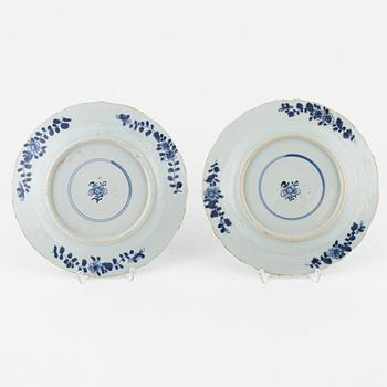 A set of four blue and white dinner plates, Qing dynasty, 18th Century.
