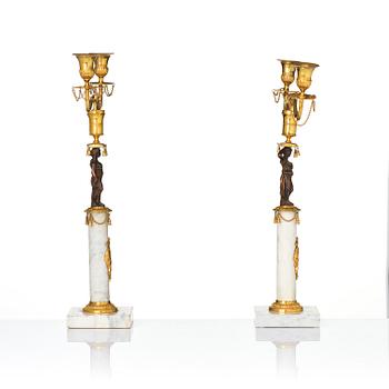 A pair of late Gustavian two-branch candelabra in the manner of F. L. Rung, Stockholm, circa 1800.