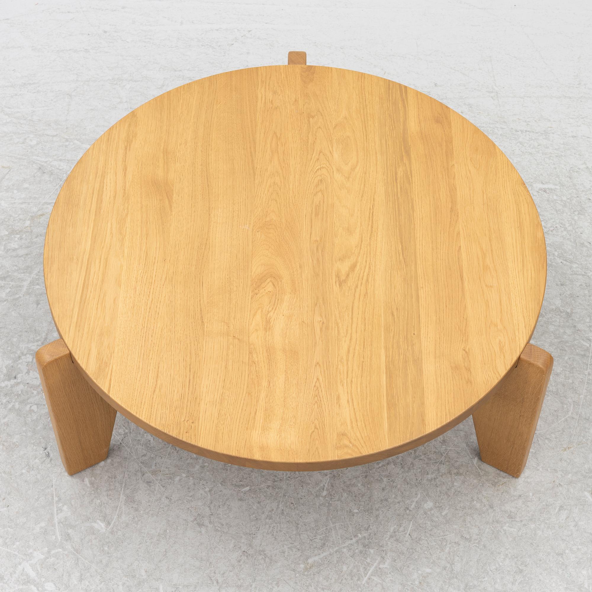Jean Prouvé, a 'Guéridon Base' coffe table, Vitra, 21st century.