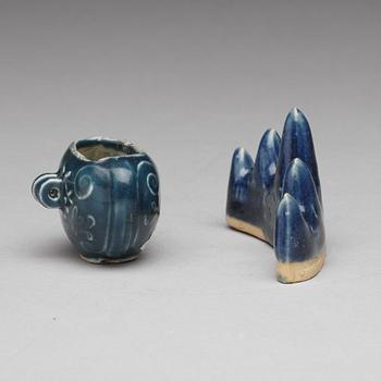 A blue glazed brush rest and a brush washer/birdcup, Qing dynasty (1644-1912).