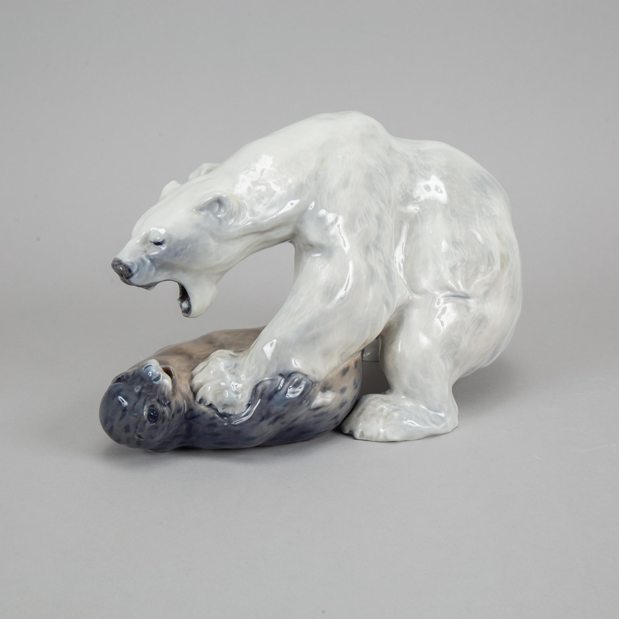 Knud Kyhn, a 1108 Royal Copenhagen porcelain polar bear and seal, Denmark, 1969-73.