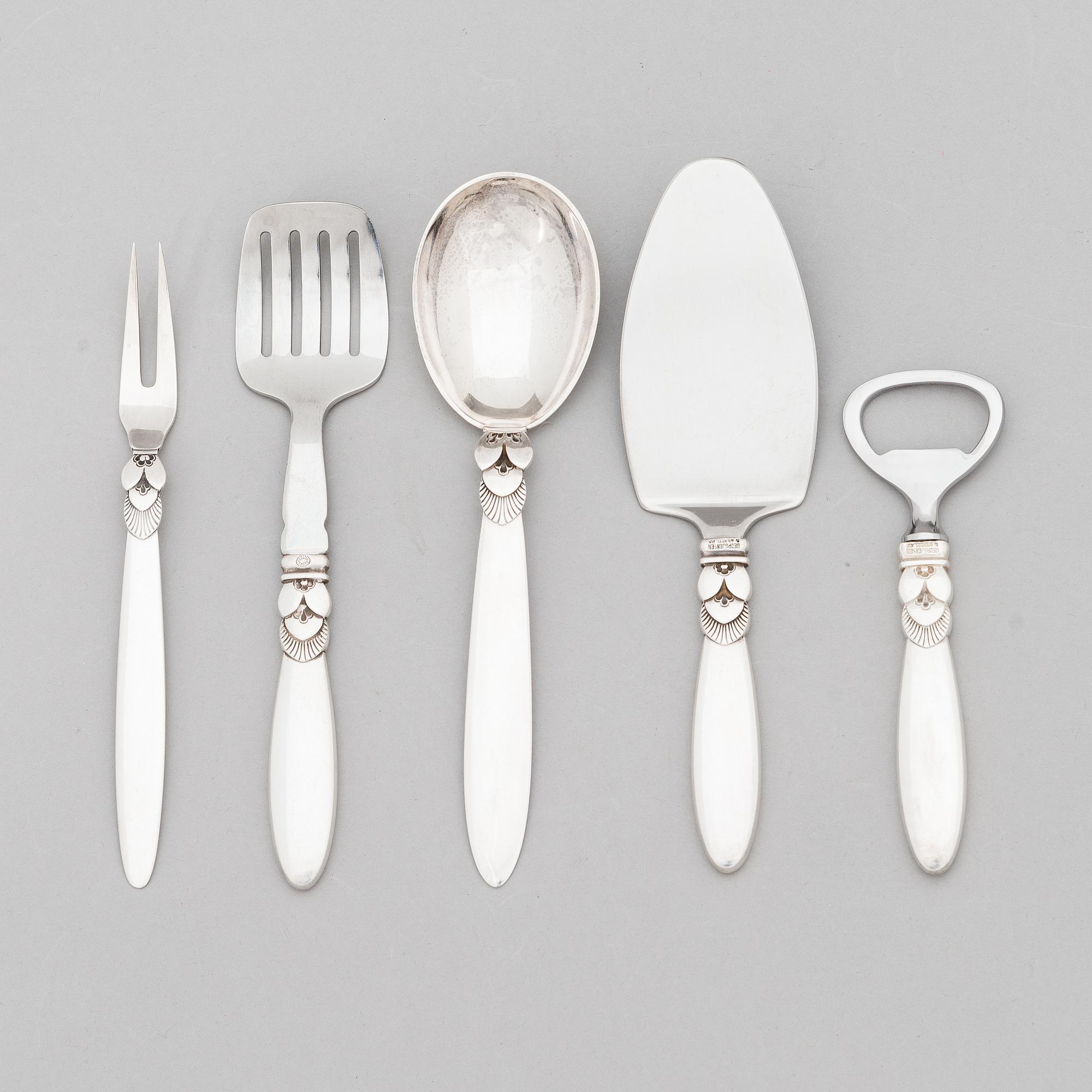 A 5-piece set of sterling silver 'Cactus' serving cutlery by Gundorph Albertus for Georg Jensen & Wendel A/S, 1945-1951.