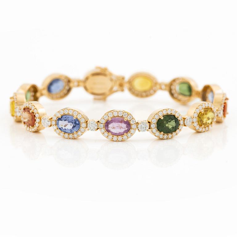 Bracelet 18K gold with oval multi-coloured sapphires and round brilliant-cut diamonds.