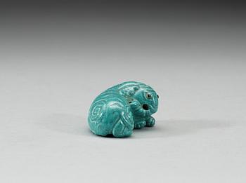 A robins egg glazed figure of a reclining elephant, Qing dynasty, presumably Qianlong (1736-95).