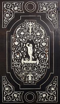 A Renaissance-style ebony, ebonized and ivory-inlaid library table, late 19th century, presumably Germany.