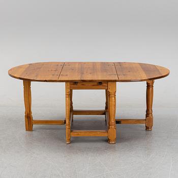 A baroque style gate-leg table, first half of the 20th century.