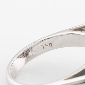 A turquoise and round brilliant cut diamond ring.