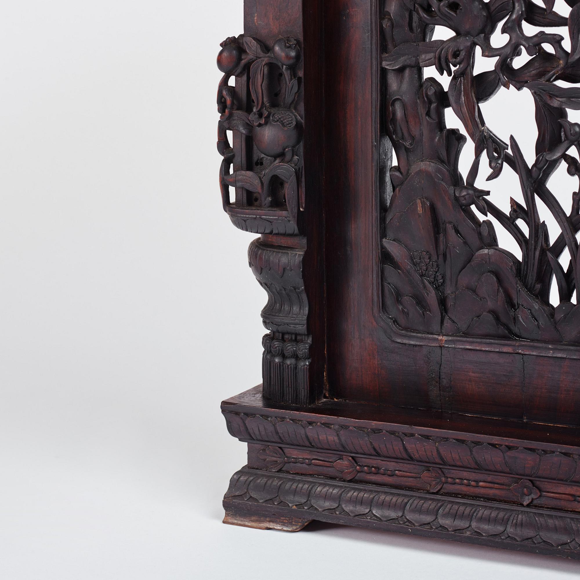 A massive zitan recessed-leg long table 'Jiaotousun Qiotouan', Qing dynasty, 19th century.