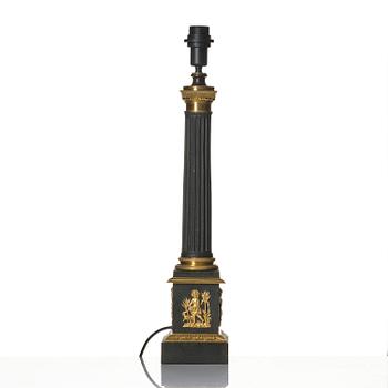 A French Empire ormolu and tole lamp, early 19th century.