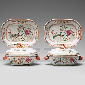 A pair of famille rose 'double peacock' butter tureens with cover and stand, Qing dynasty, Qianlong (1736-95).