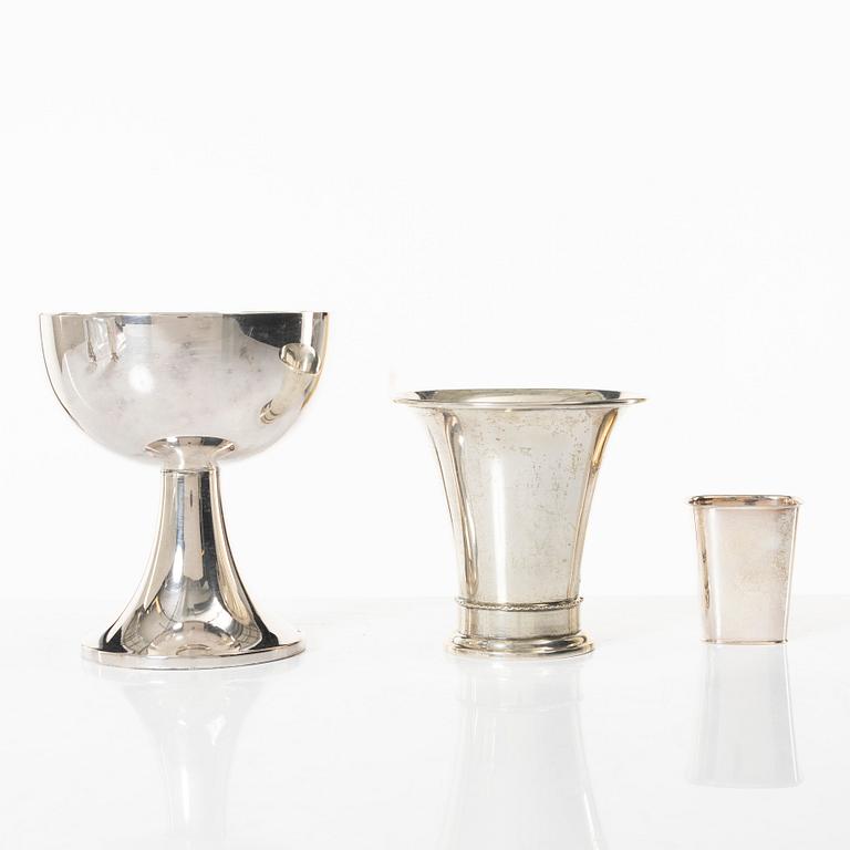Five silver beakers and a salt cellar, including mark of Gustaf Jansson, CG Hallberg, Stockholm 1960.
