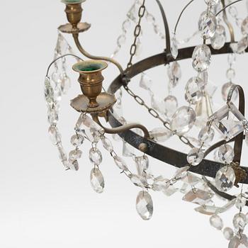 A Gustavian style chandelier, around the year 1900 incorporating older elements.