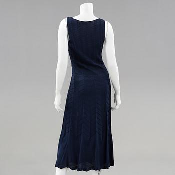 A knitten dress with long cardigan by Ralph Lauren.