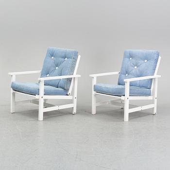 Elsa Stackelberg, a pair of painted aluminium armchairs, Fri Form, late 20th century.