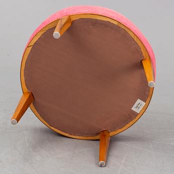 A ottoman model 647 from Svenskt Tenn.